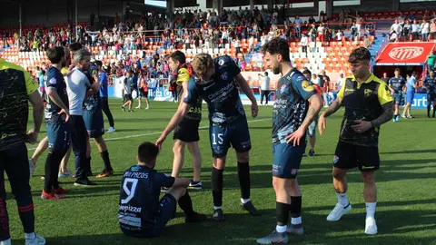 Los jugadores del Barco, abatidos al final del partido